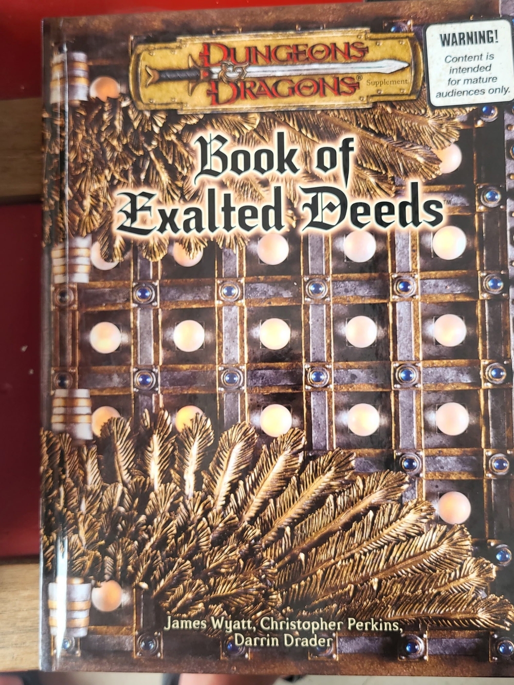Dungeons & Dragons: Book of Exalted Deeds - Gold and Brown Hard Cover